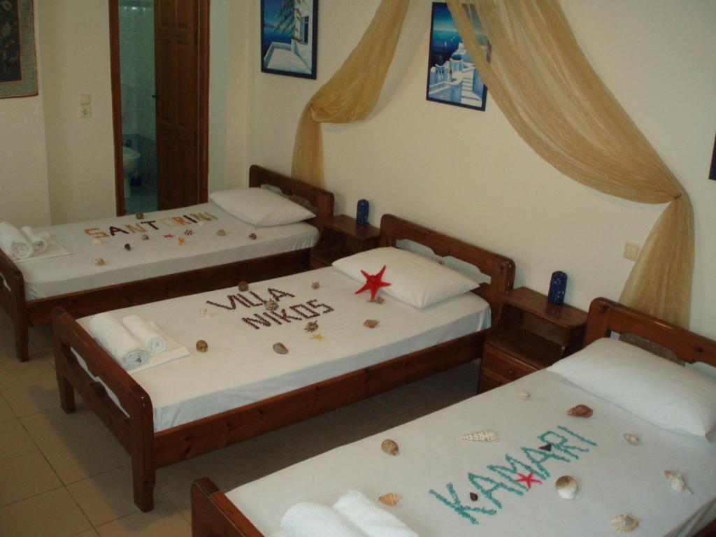 Villa Nikos Karamolegkos Kamari Kamári Quarto foto